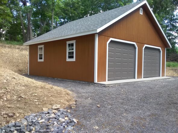 brown garage with gray door