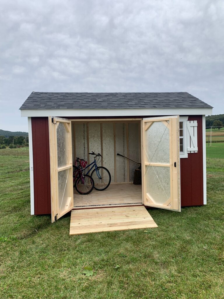 red shed with open doors