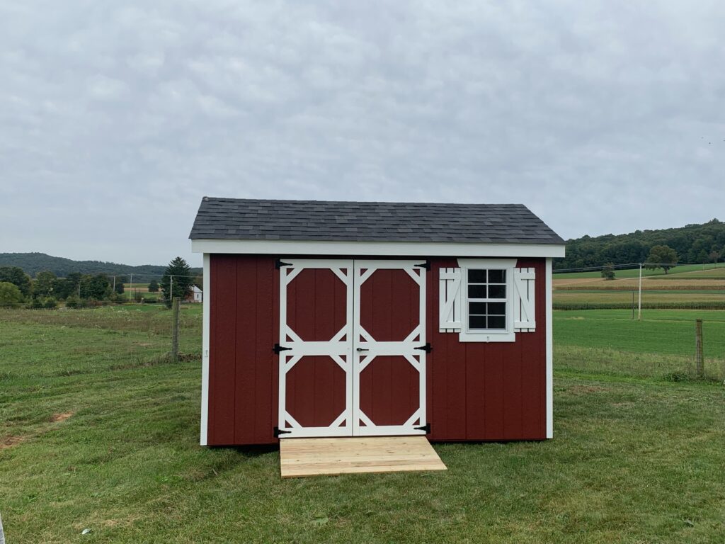 red shed with white trim