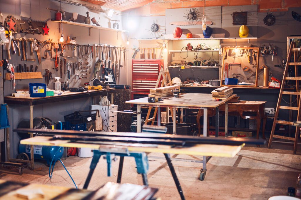 A wood workshop inside a garage.