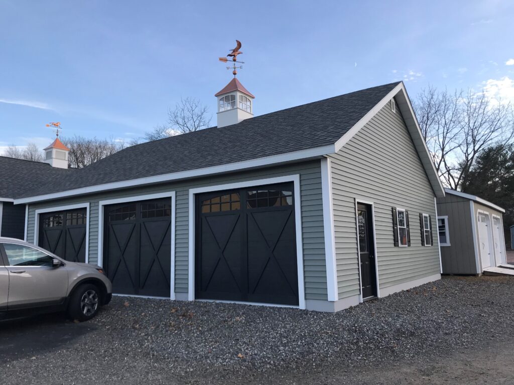 3 car garage gray with black doors