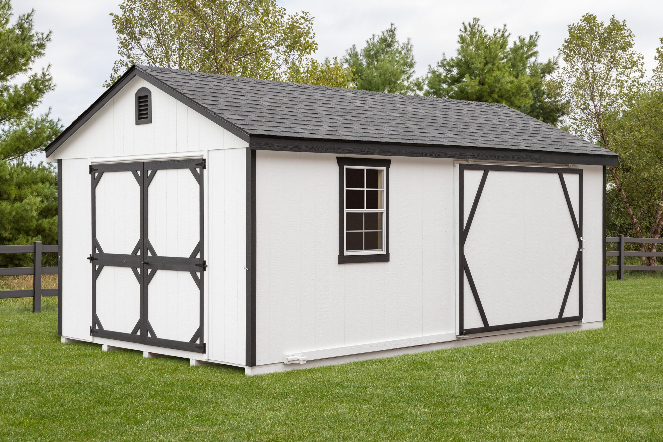white shed shed with brown accent