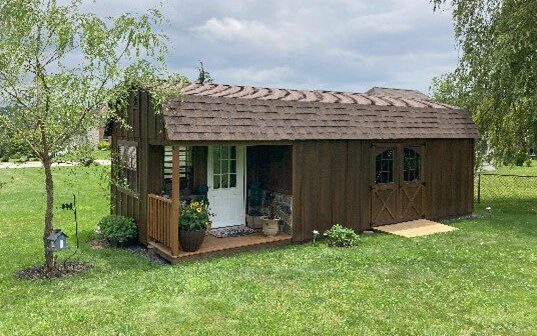 wooden shed with porch