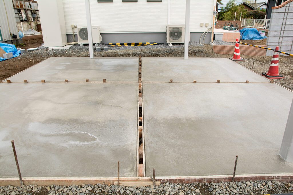 Concrete poured onto a foundation.