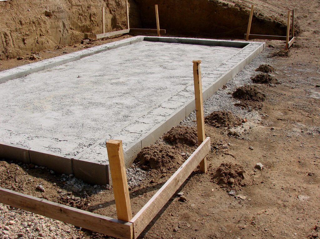 A cement pad prepped for a new garage.