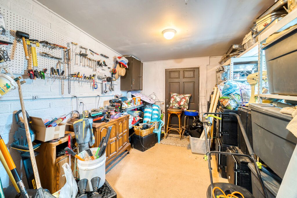 The inside of a backyard storage shed.